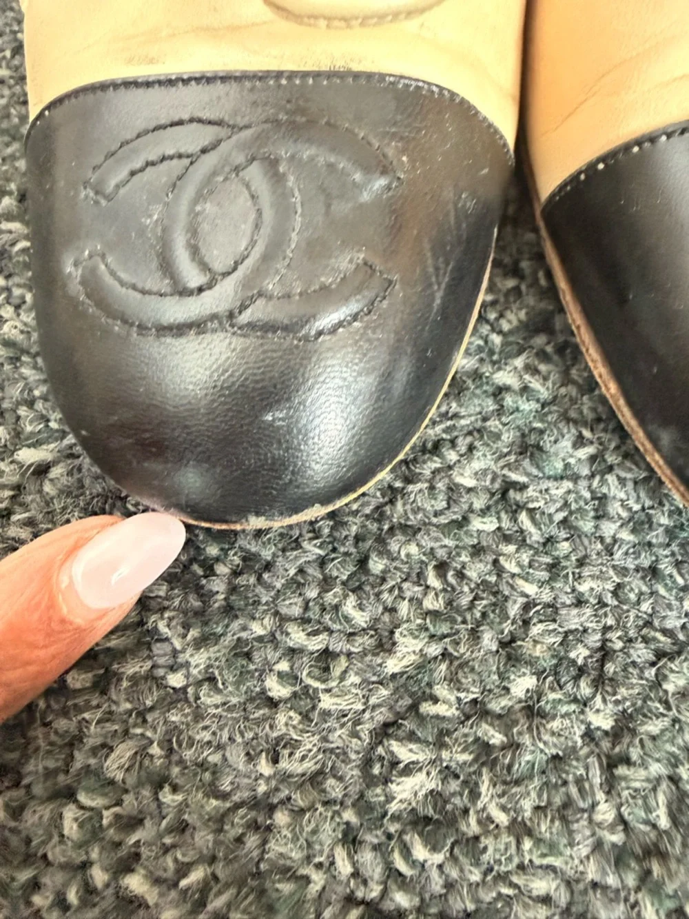 CHANEL Two-Tone Beige and Black Cap-Toe Leather pumps